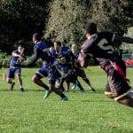 Flag football player diving during a game