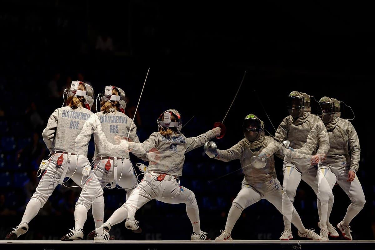 Sabre teams lined up on the strip at a world championship
