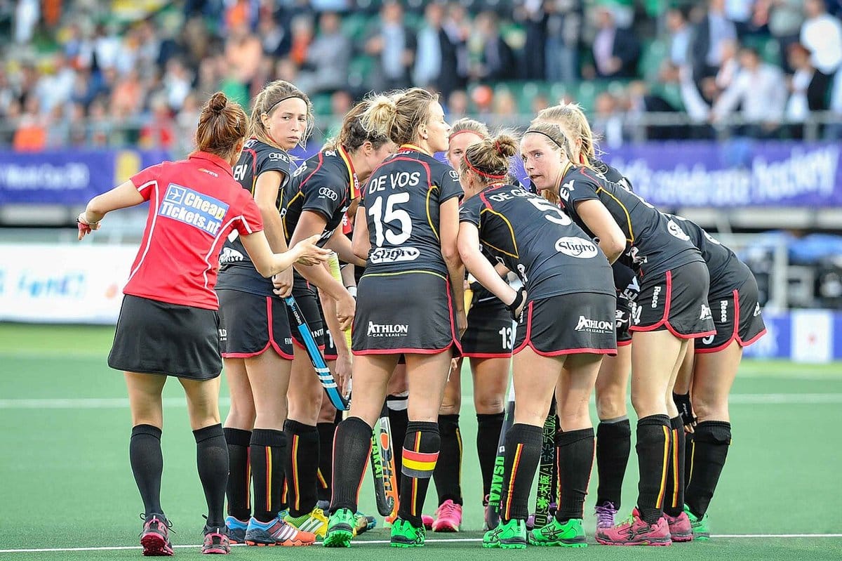 Field hockey team huddled together before a match