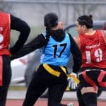 Flag football players wearing flag belts