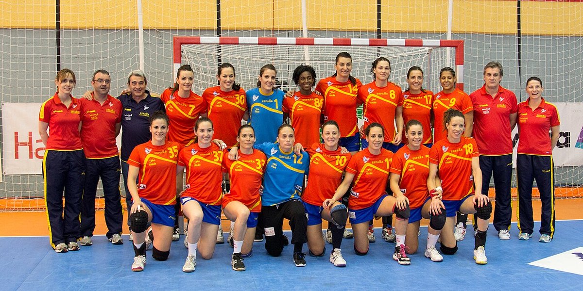Women handball team posing for a tournament photo